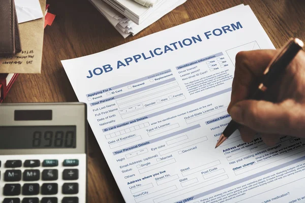 Person writing on white paper — Stock Photo, Image