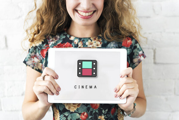 woman holding tablet