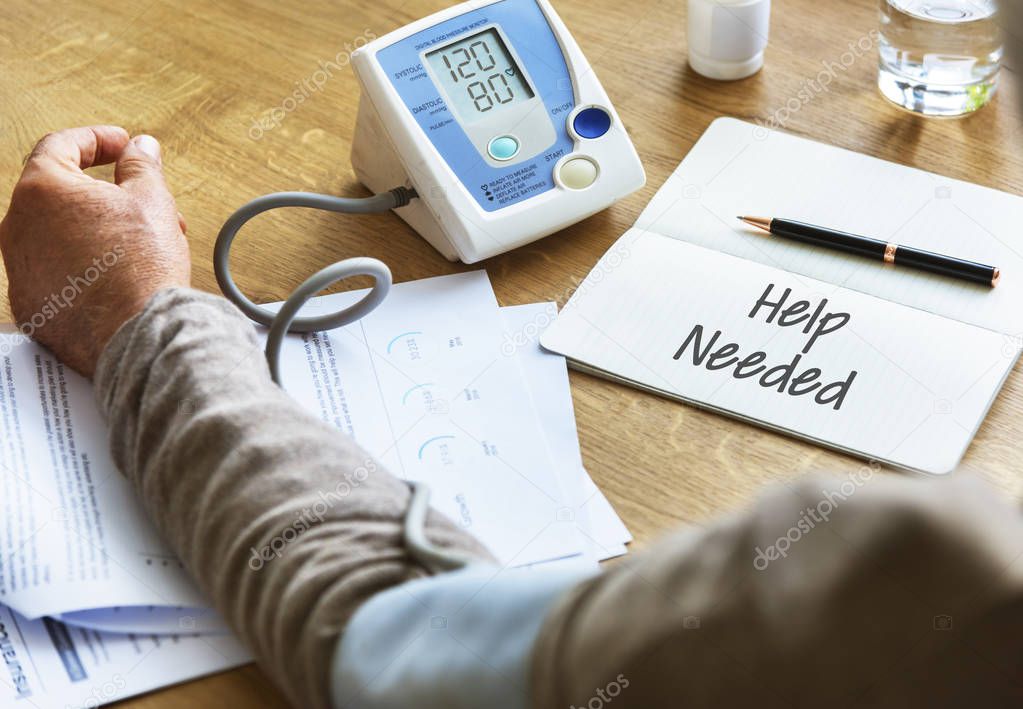 man checking blood pressure