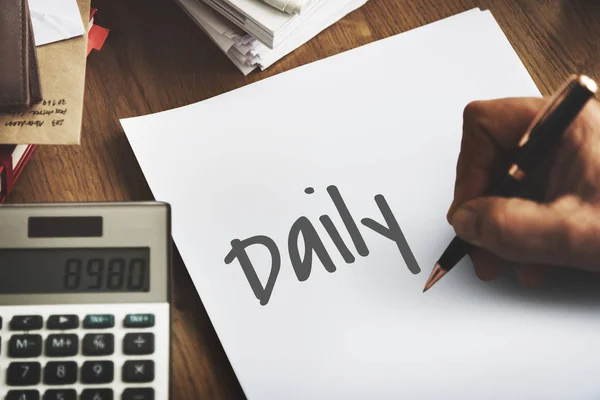 Person writing on white paper — Stock Photo, Image