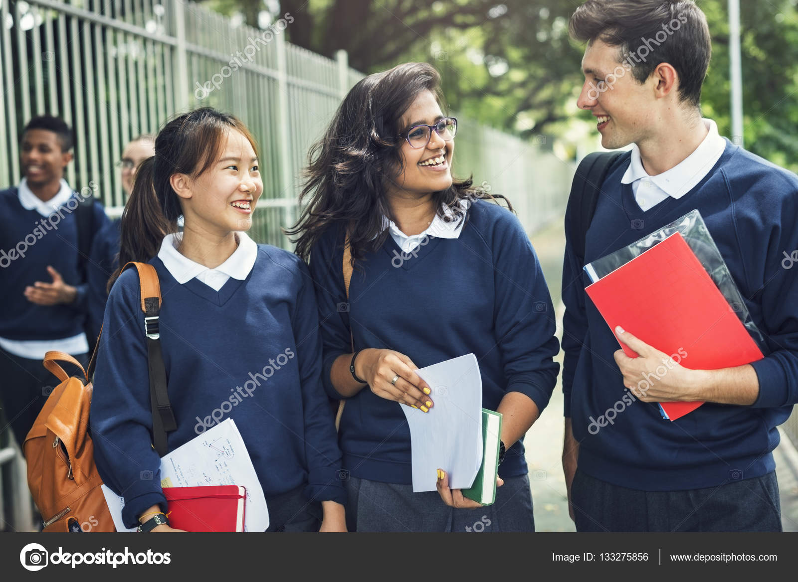 Diverse Students in school uniform — Stock Photo © Rawpixel 133275856