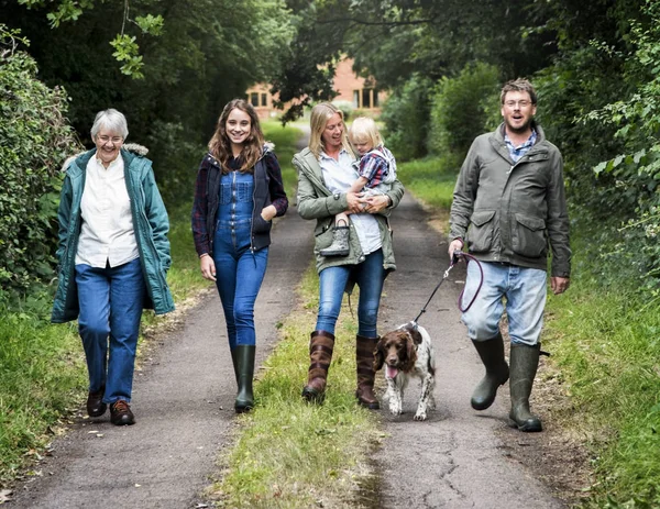 Family Walking with Dog — Stock Photo, Image