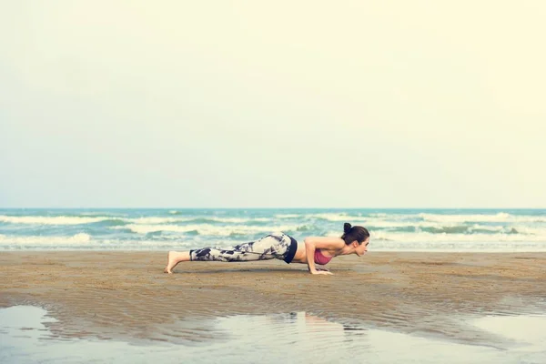 Woman doing Plank exercise — Stock Photo, Image