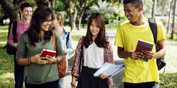 Diverse students studying Outdoors — Stock Photo, Image