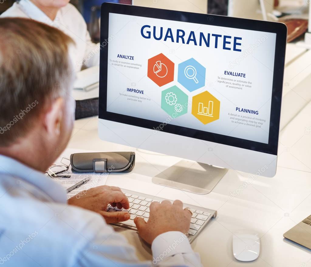 Mature businessman working on computer