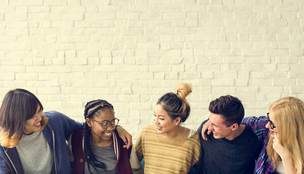 students hugging together