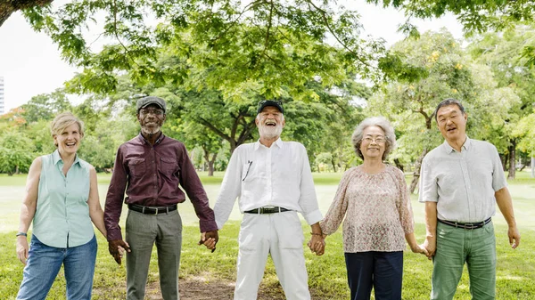 Senior Friends have fun at park — Stock Photo, Image