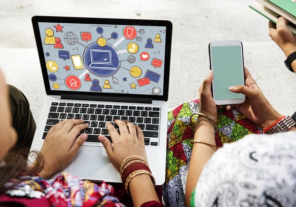 People using laptop and mobile — Stock Photo, Image