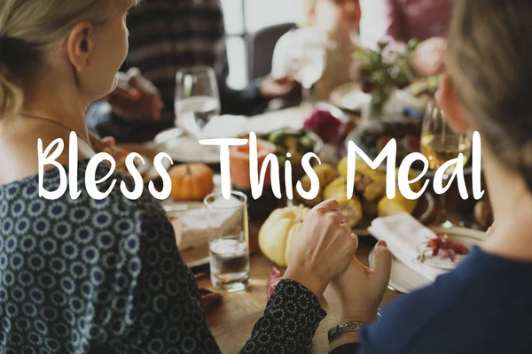 People eating at served table — Stock Photo, Image