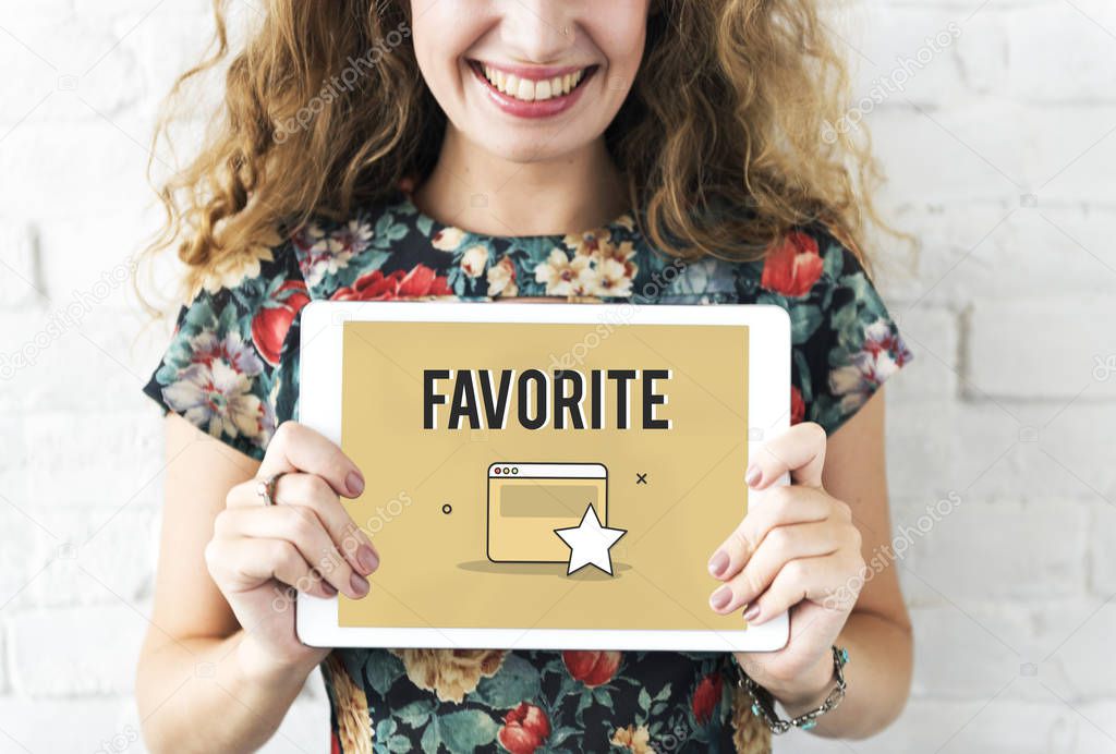 woman holding tablet