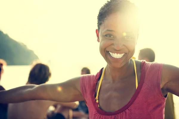 African Woman smiling on beach — Stock Photo, Image