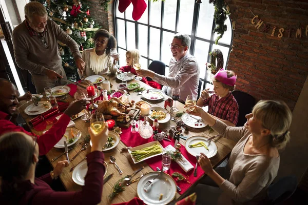 Family celebrating Christmas eve at home — Stock Photo, Image