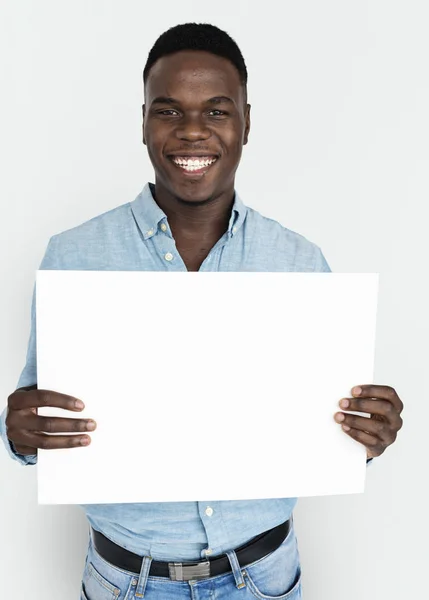 Homem segurando cartaz — Fotografia de Stock