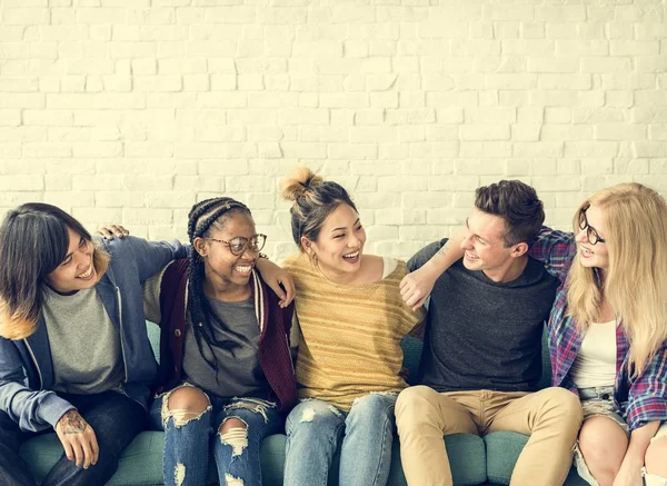 Students hugging together — Stock Photo, Image