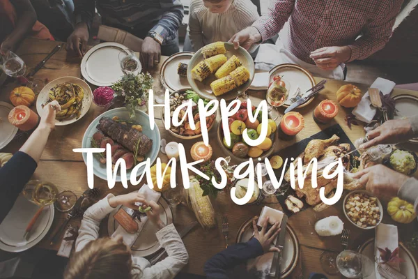 People eating at served table — Stock Photo, Image