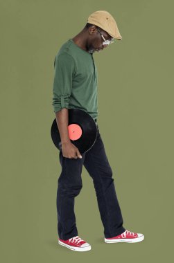 Vinil disk tutan adam