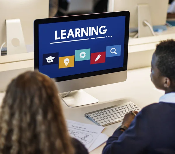 Classmate pupils using computer — Stock Photo, Image