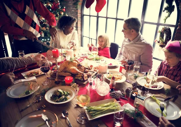 Family celebrating Christmas eve at home — Stock Photo, Image