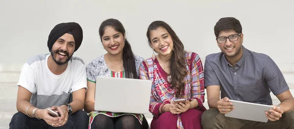 Indian students with digital gadgets — Stock Photo, Image
