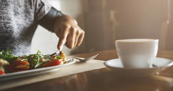 Person dinning at table with coffee — Stock Photo, Image