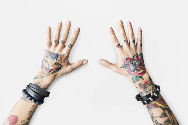 Woman's hands in tattoos — Stock Photo, Image