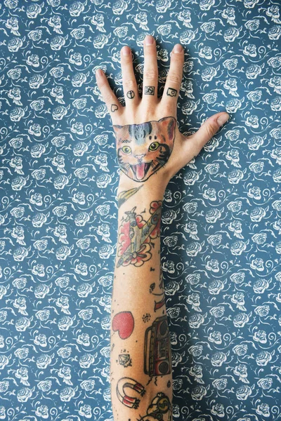 Hand covered with tattoos — Stock Photo, Image