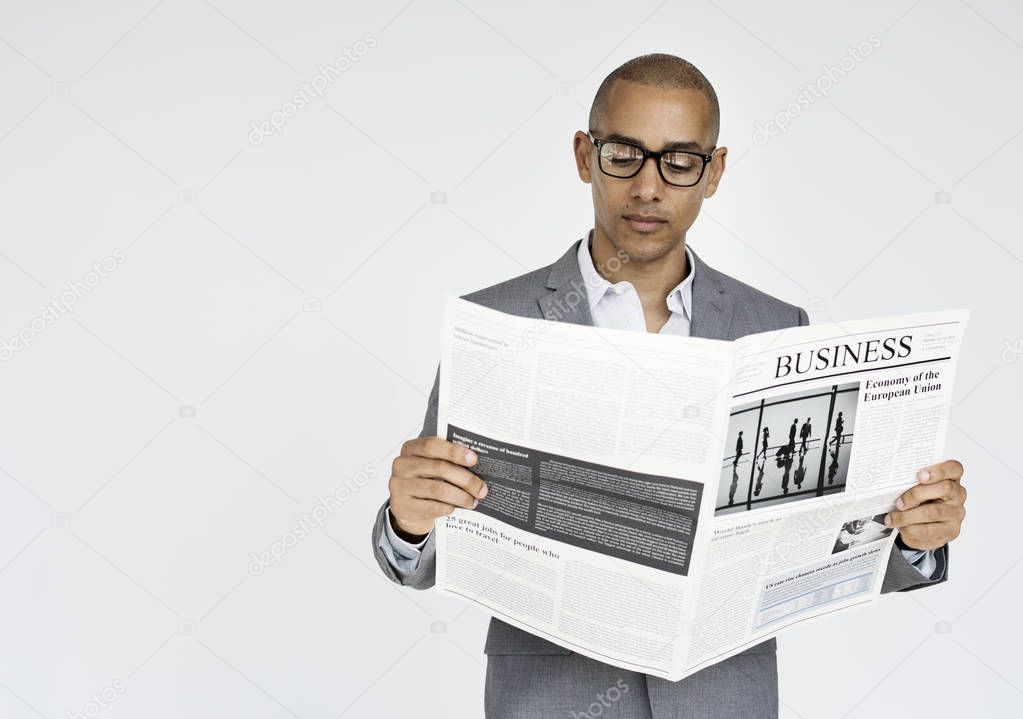 Businessman Reading Newspaper