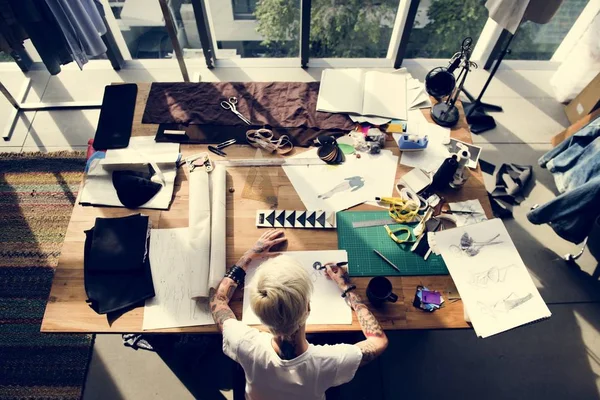 Fashion designer working in Showroom — Stock Photo, Image