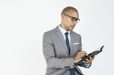 Defterde yazan iş adamı