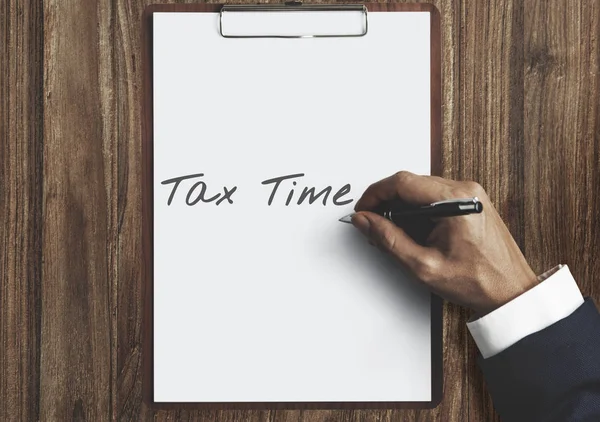 Businessman writing on white paper — Stock Photo, Image