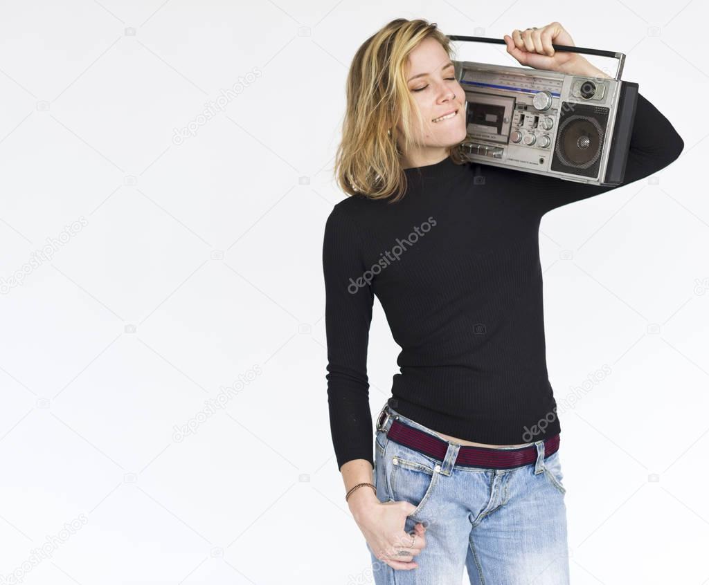 Woman holdin Radio Boombox