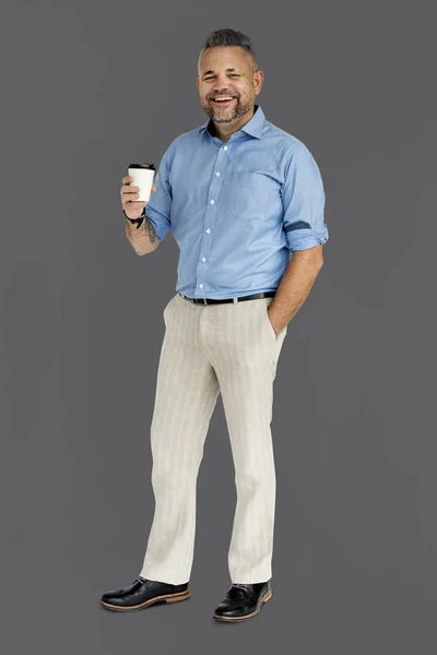 Man som håller i en kopp kaffe — Stockfoto