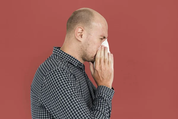 Man Sneezing in Studio — Stock Photo, Image