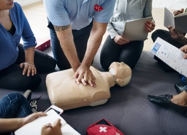 People learning CPR First Aid Training  clipart