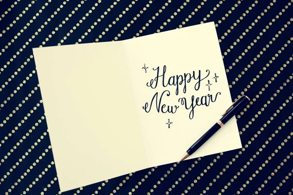 Text in card and pen — Stock Photo, Image