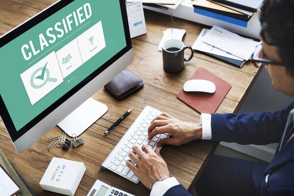 Businessman in suit using Computer  