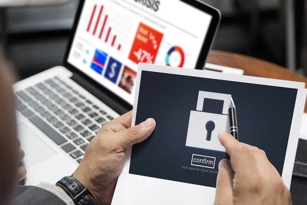 Businessman holding document — Stock Photo, Image