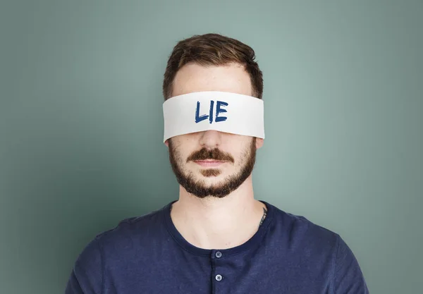 Homem bonito com olhos cobertos — Fotografia de Stock