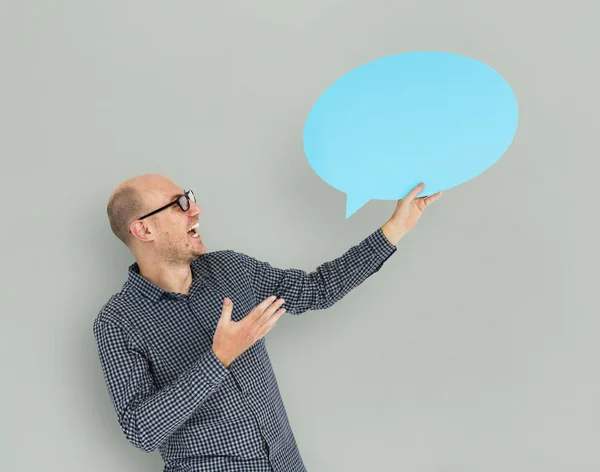 Hombre sosteniendo la burbuja del habla — Foto de Stock