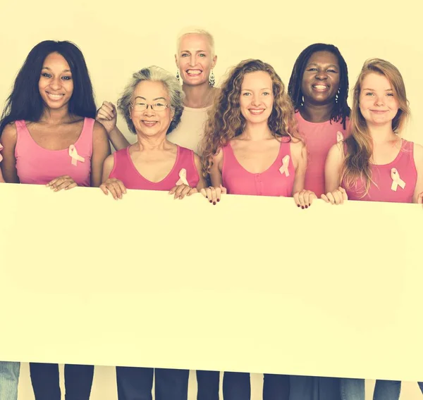 Women holding informational board — Stock Photo, Image