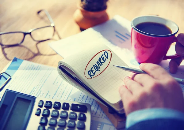 Businessman writing in notebook — Stock Photo, Image