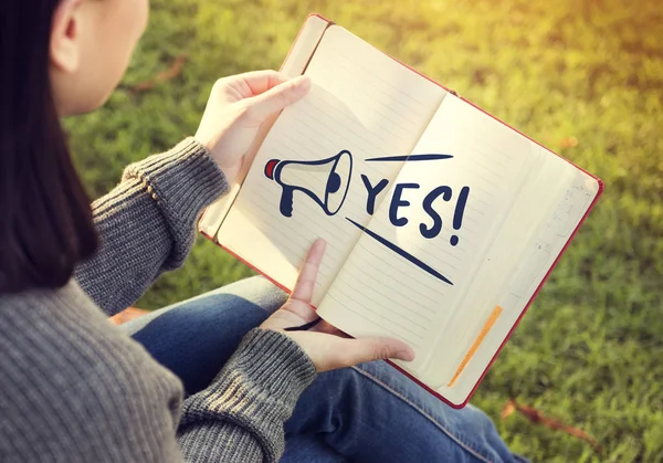 Woman with paper notebook in hands — Stock Photo, Image