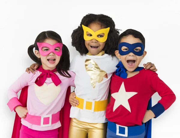 Mijn lieve kinderen in superhelden kostuums — Stockfoto