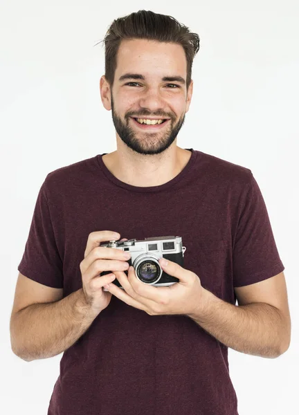 Człowiek posiadający kamery filmowej — Zdjęcie stockowe