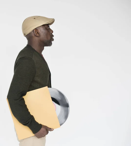 Afrikansk Man håller vinylskiva — Stockfoto