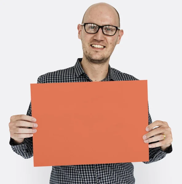 Hombre sosteniendo pancarta —  Fotos de Stock