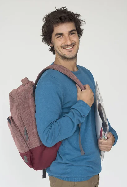 Привлекательный студент с рюкзаком — стоковое фото