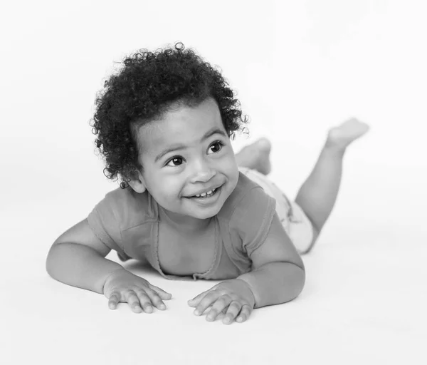 Cute African Child laying on floor — Stock Photo, Image