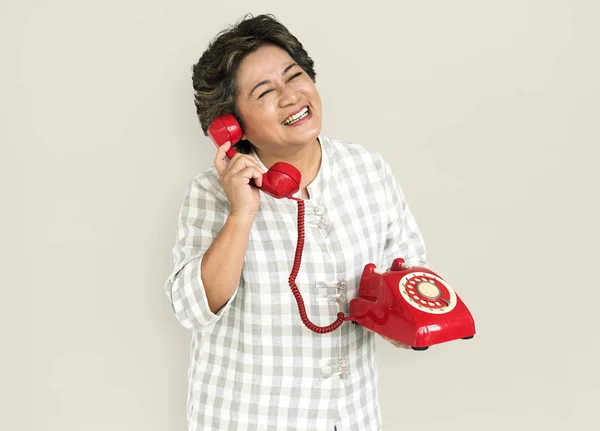 Lady bedrijf rode telefoon — Stockfoto