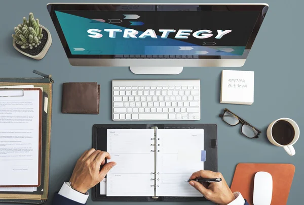 Business man writing in notebook — Stock Photo, Image